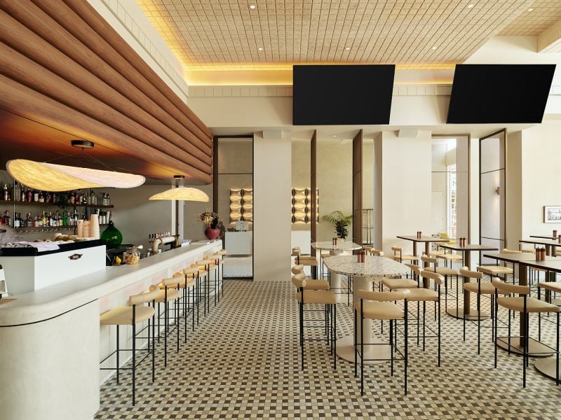 Novotel St Kilda. The bar and dining room on the tiled floor.